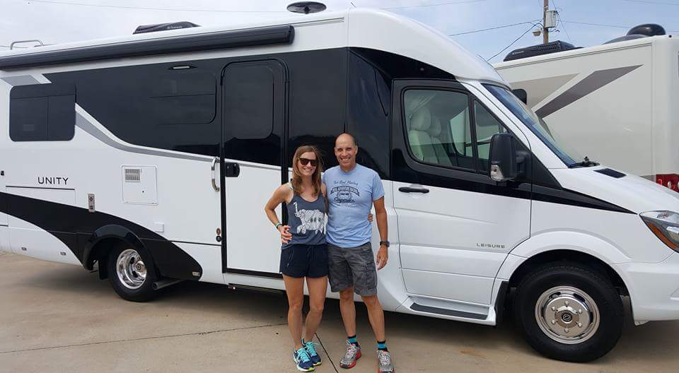 a couple stands in front of their new LTV