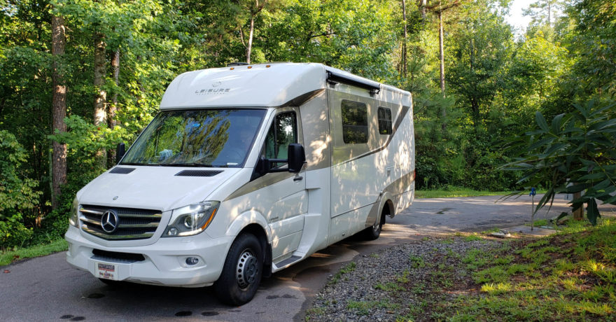 RV parked in a woods